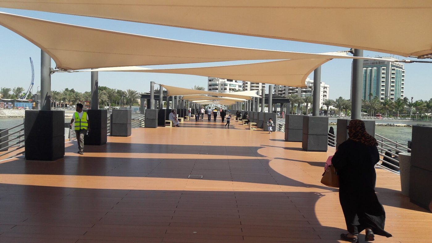 A shaded waterfront promenade on the Jeddah Corniche