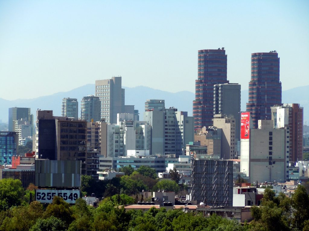 High-rise towers of Polanco, Mexico City, with mountains behind